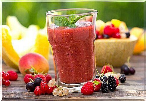 glass with cranberry smoothie