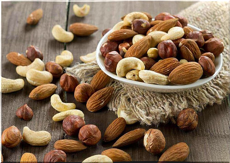 Nuts in a bowl and on the table