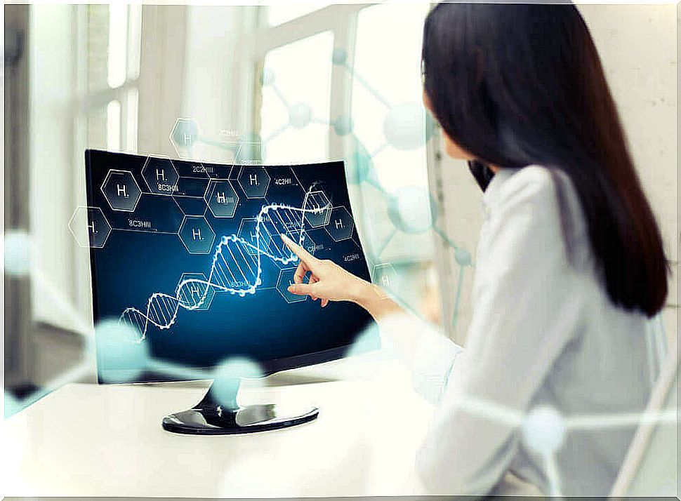 Woman studying genes on her computer