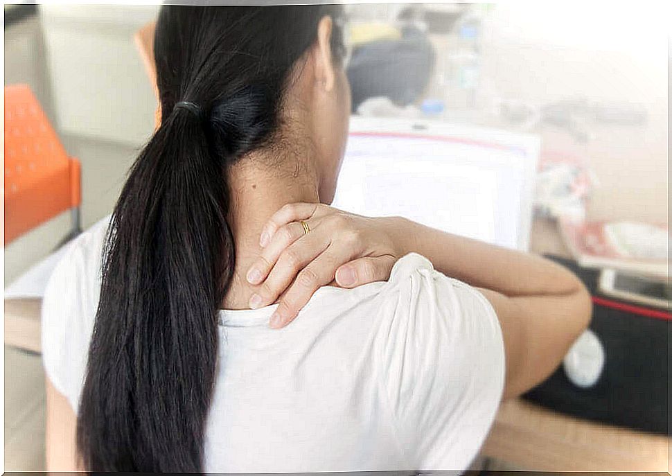 Woman who suffers from pain in her neck from all the sitting