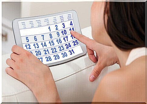 Girl calculating her menstrual cycle