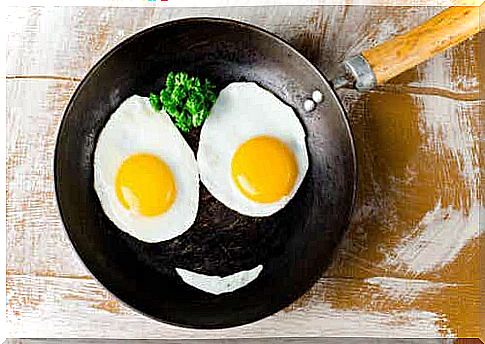 Two fried eggs in a pan