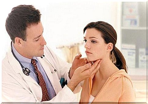 Doctor does lymph node examination on woman