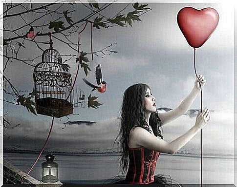 woman with a heart balloon