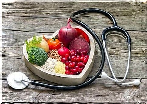 Heart shaped bowl with healthy food