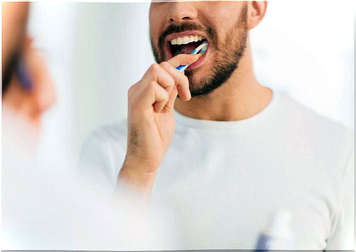 Man brushing his teeth