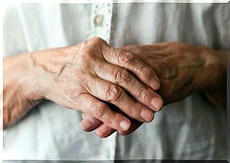 The hands of an elderly man