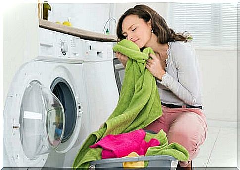 Woman smells towels